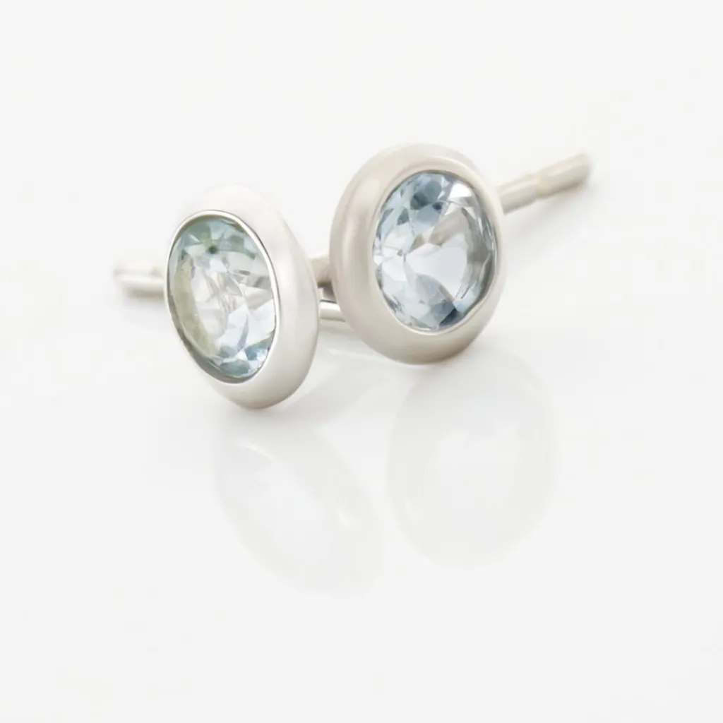 Histoire d'Or Boucles D'oreilles Puces Edy Serti Clos Or Blanc Topaze or blanc topaze bleue Outlet