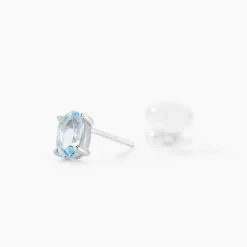 Histoire d'Or Boucles D'oreilles Puces Ovale Serti Griffe Or Blanc Topaze or blanc topaze bleue