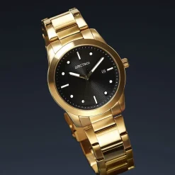 ARCTIK Montre Element Noir cadran doré fond noir bracelet acier doré