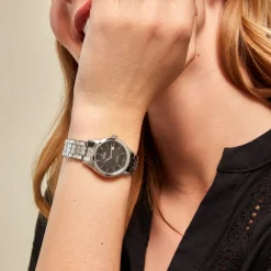 FESTINA SWISS MADE Montre 29 Noir cadran argenté fond noir bracelet acier argenté Sale