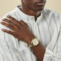 LACOSTE Montre Le Croc Champagne cadran doré fond champagne bracelet acier doré Best