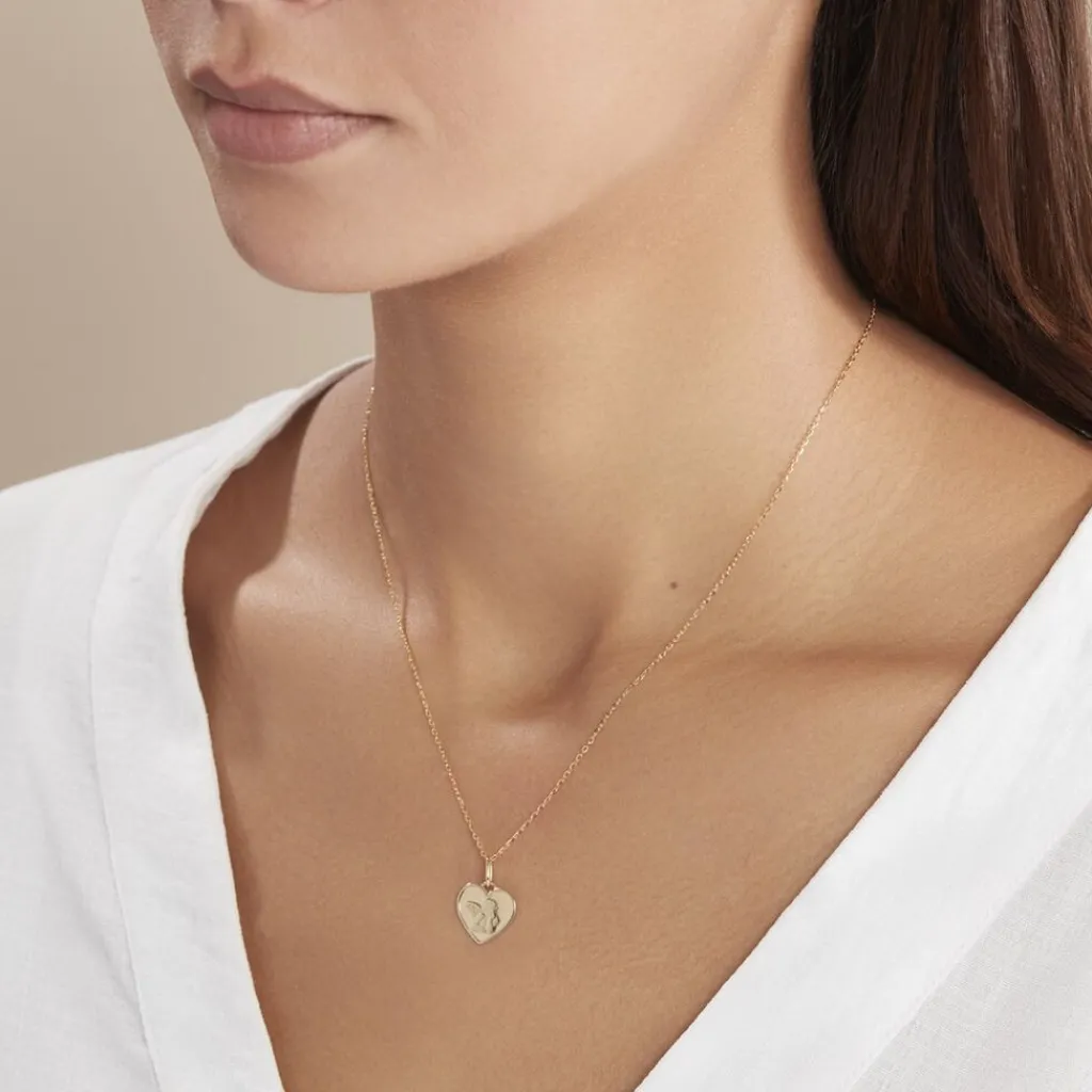 Histoire d'Or Pendentif Ange Coeur or jaune Sale